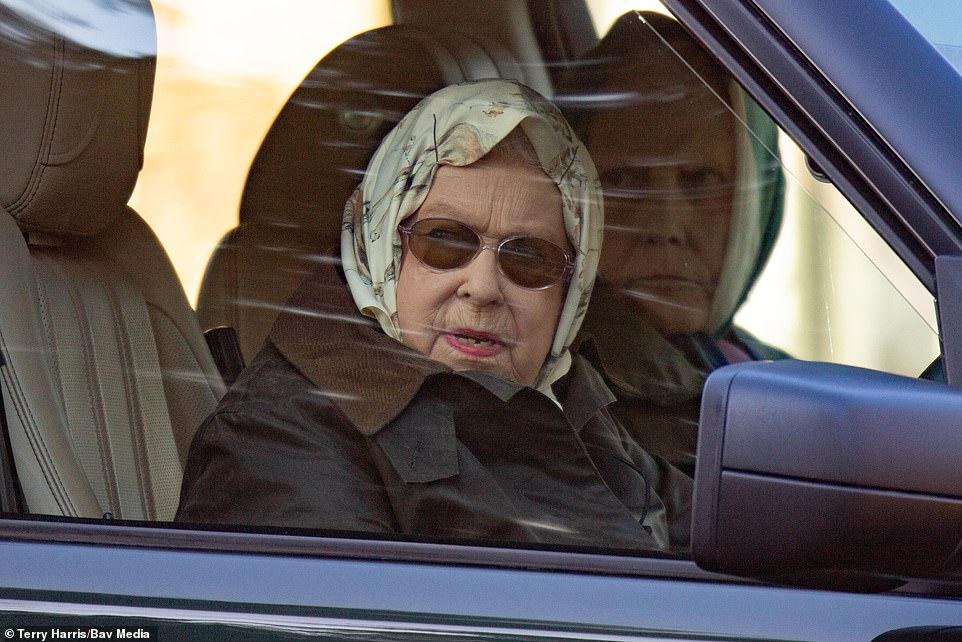 The Queen appeared stony-faced as she drove through Sandringham on Saturday afternoon, hours before the bombshell statements were issued